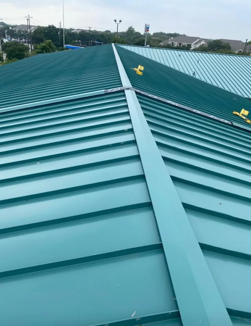 Green commercial metal roof ridge and valley for Metal Roof Repair in West Vincent